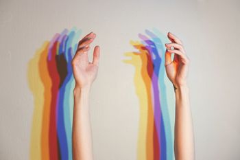 Close-up of hand against white background