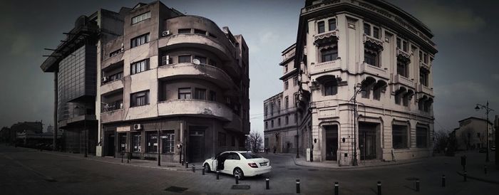 Buildings in city against sky