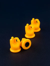 Close-up of toy on black background
