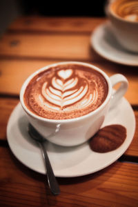 Close-up of cappuccino on table