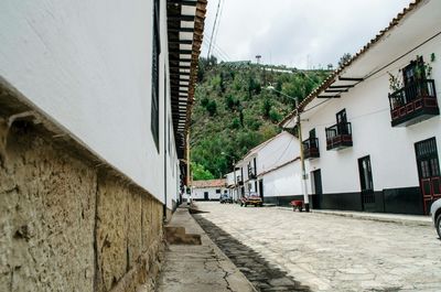 Narrow alley along buildings