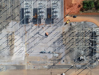 High angle view of construction site by building in city