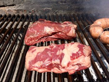 Close-up of meat on barbecue grill