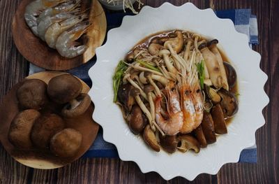 High angle view of mushrooms in plate on table