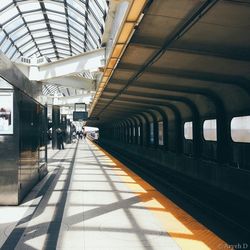 People at railroad station platform