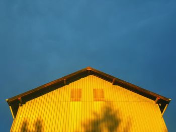 Low angle view of roof against sky