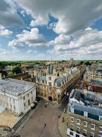 High angle shot of cambridge university colleges against sky with clouds