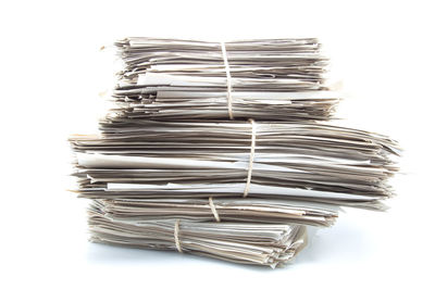 Close-up of stack against white background