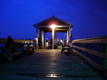 Illuminated street light at night