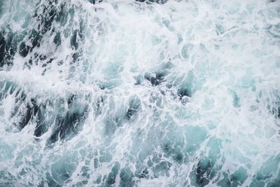 Close-up of waves splashing in sea