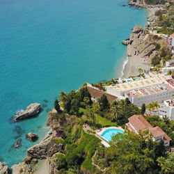 Aerial view of resorts by sea