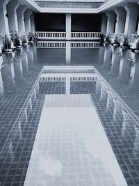 Reflection of building on swimming pool