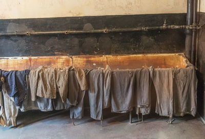 Clothes drying against wall