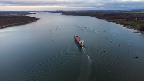 High angle view of boat in sea against sky