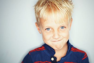 Close-up portrait of smiling boy