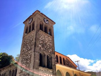 Low angle view of building against blue sky