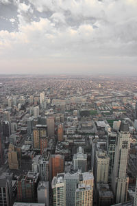High angle view of buildings in city against sky