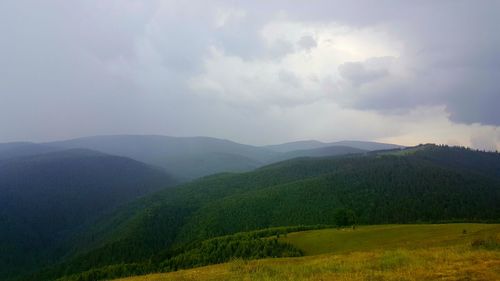 Scenic view of mountains against sky