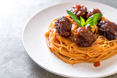 Close-up of pasta in plate on table