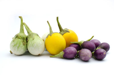 Close-up of fruits against white background