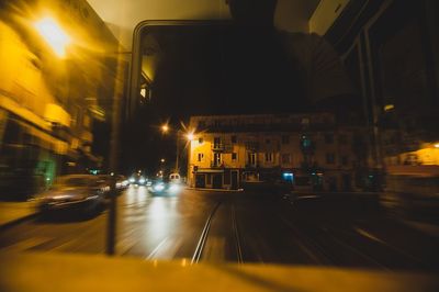 Blurred motion of car moving on road at night