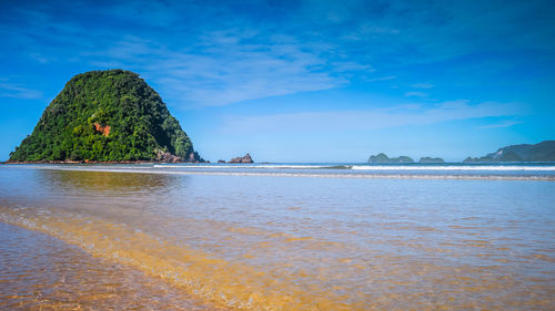 Scenic view of sea against blue sky