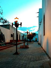 Street in city against sky