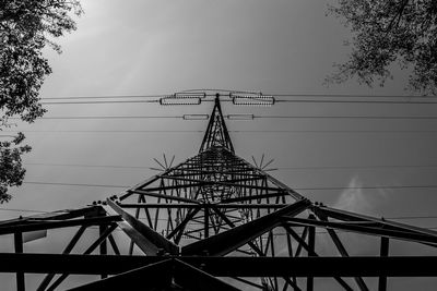 Steel beams make up the intricate geometries of a high voltage pylon