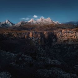 Scenic view of snowcapped mountain against sky