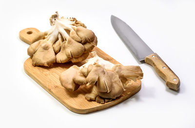 High angle view of bread on cutting board