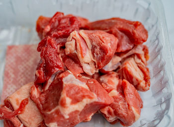 High angle view of chopped meat in plate on table