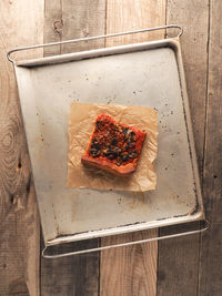 High angle view of meat in container on table