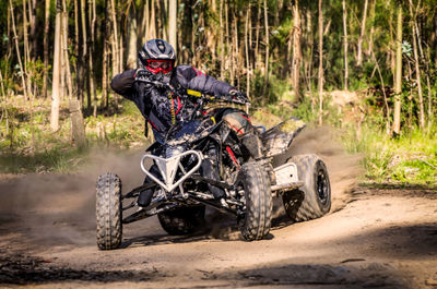 Man riding motorcycle on road