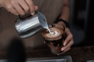 Man holding coffee cup