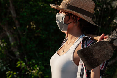 Rear view of woman wearing hat