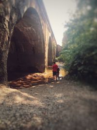 Woman walking on walkway