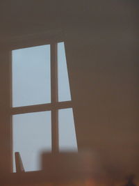 Low angle view of sky seen through window