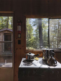 Stovetop with pot in a cabin in the forest