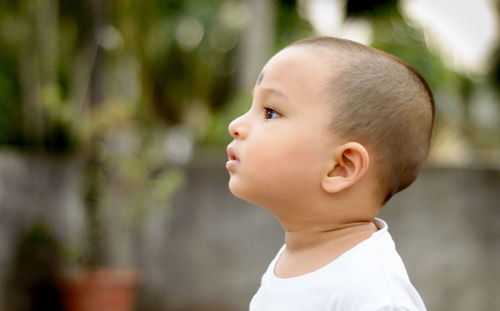 Close-up of boy looking away