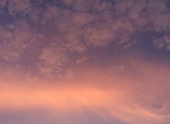 Low angle view of dramatic sky during sunset
