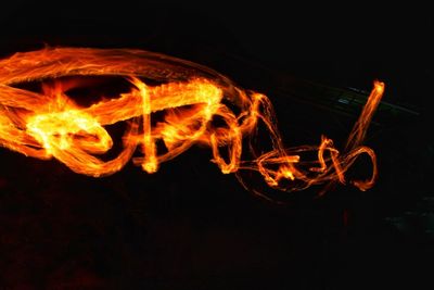 Close-up of fire against black background