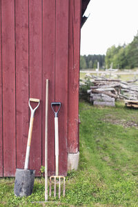 Gardening tools outside barn at farm