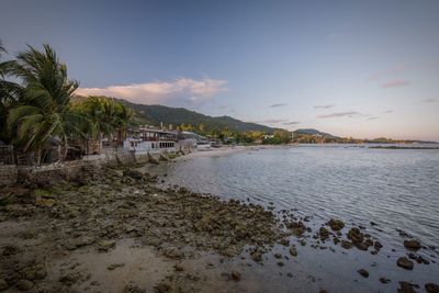 Scenic view of sea against sky at sunset