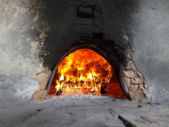 Close-up of fire on wooden wall