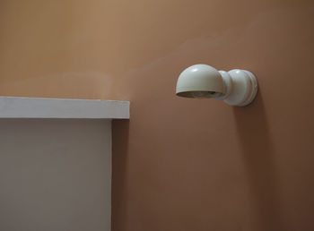 Electric lamp on wall