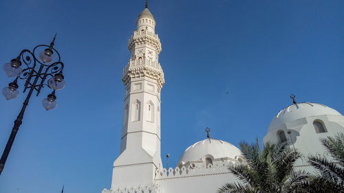 Low angle view of building against blue sky