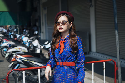 Young woman standing outdoors