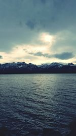 Scenic view of sea against cloudy sky