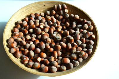High angle view of eggs in container against white background