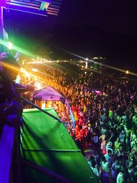 Panoramic view of crowd at night